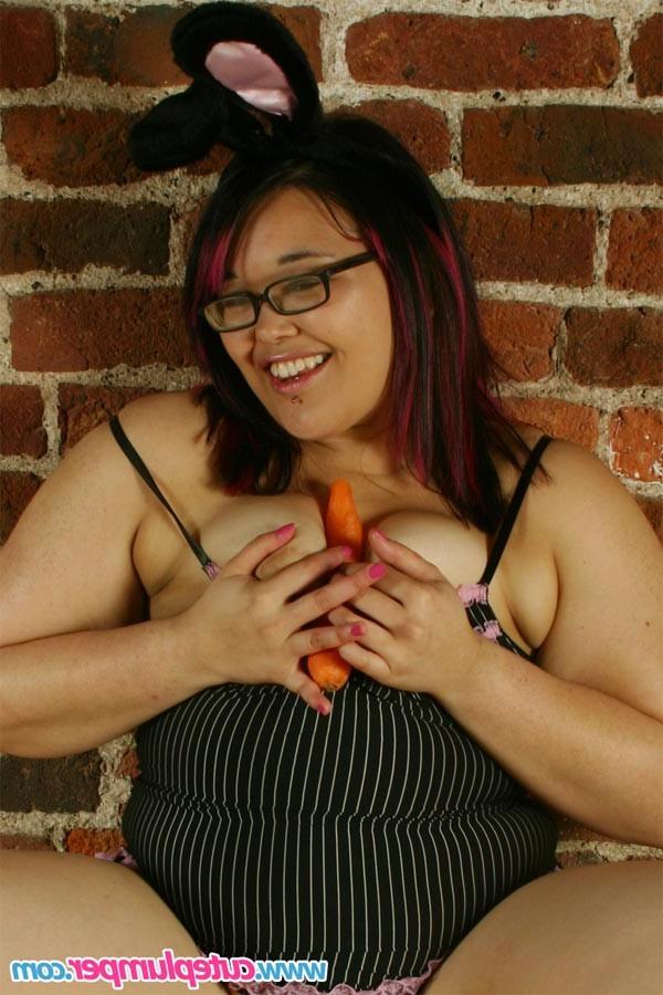 16P Ethnic plumper plays with her shaved pussy