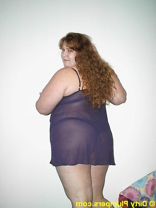 16P Chubby redhead with big natural tits