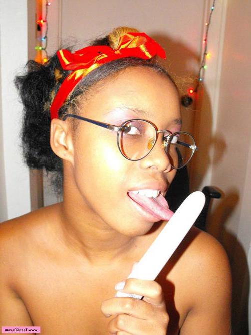 17P Horny amateur ebony teen fingering and playing with a dildo