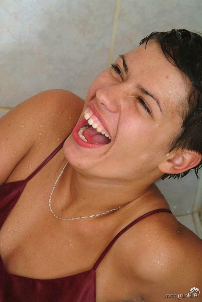 14P showering hairy brunette has some fun with her favorite cucumber