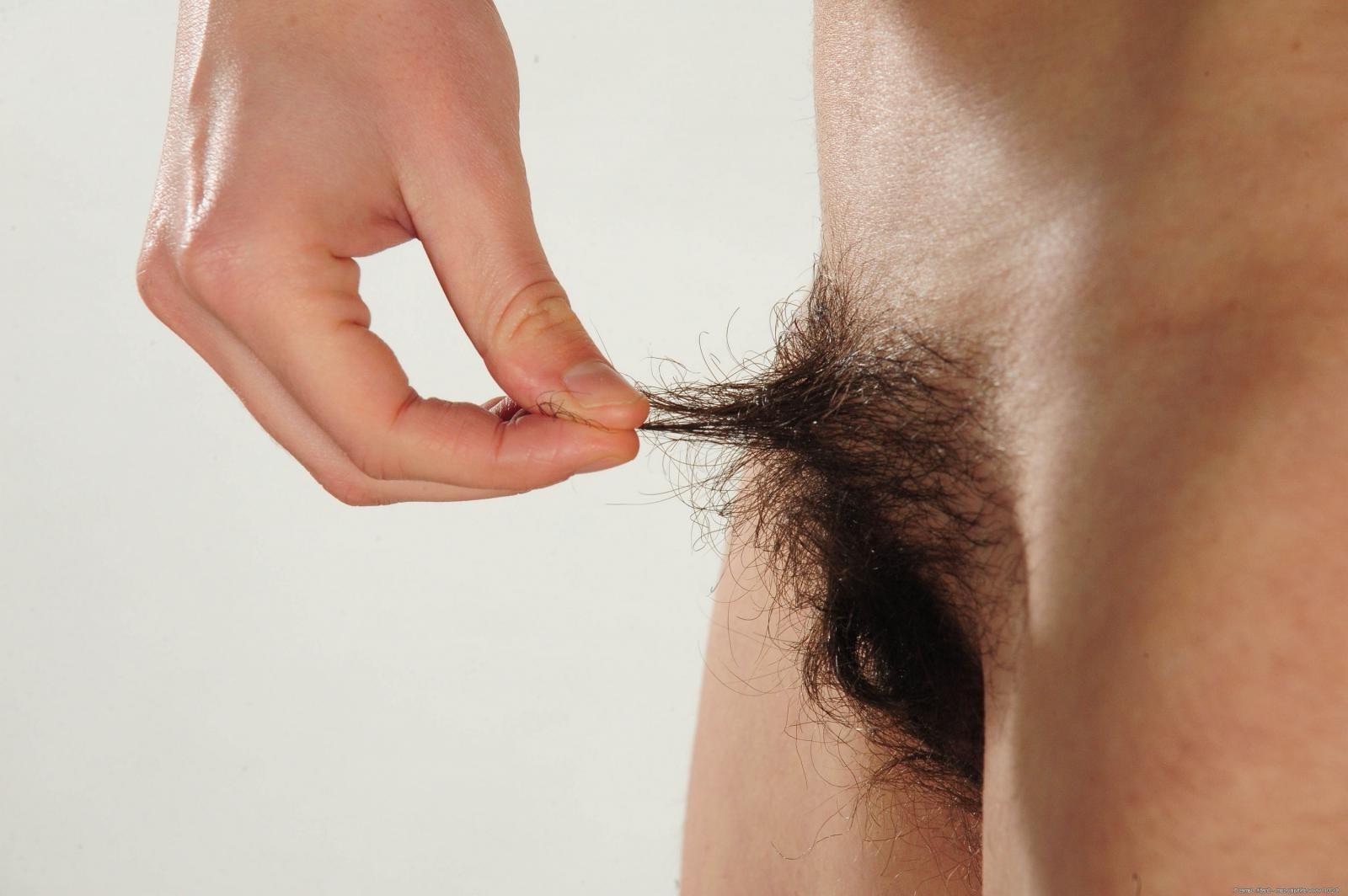 15P Hairy exotic amateur teen spreads furry pussy