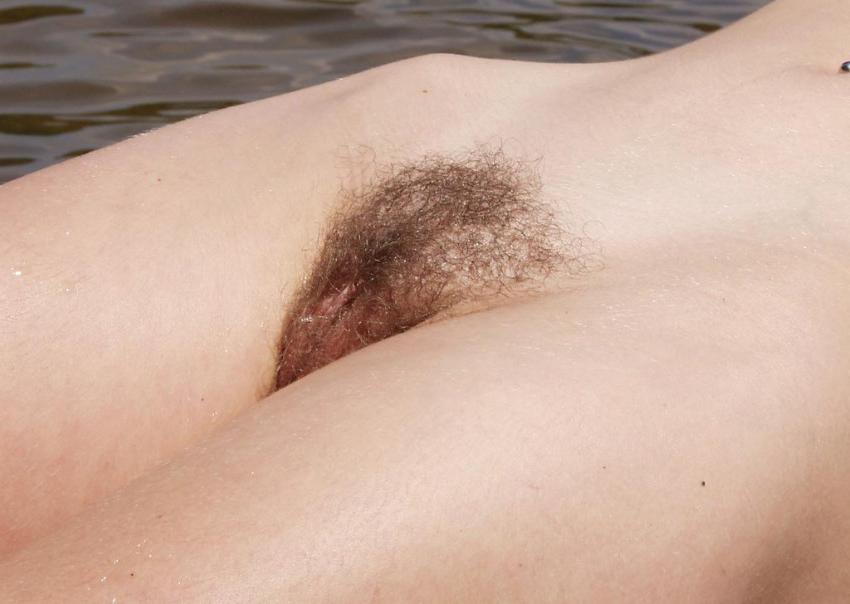 15P Hairy pussy babe swimming in lake