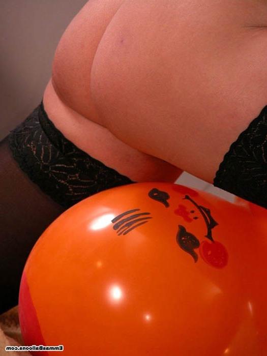 16P redhead babe playing with a big balloon