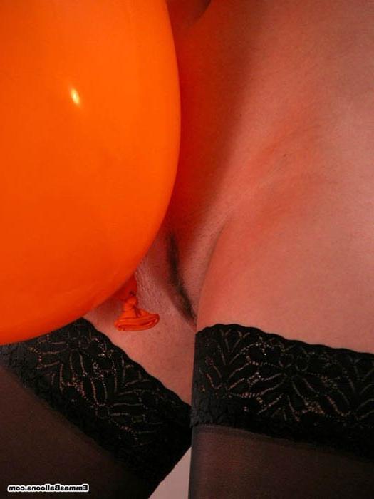 16P redhead babe playing with a big balloon