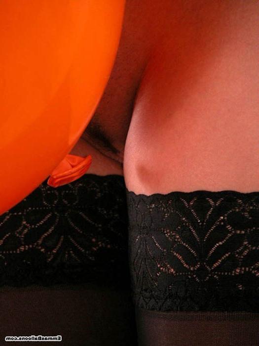 16P redhead babe playing with a big balloon