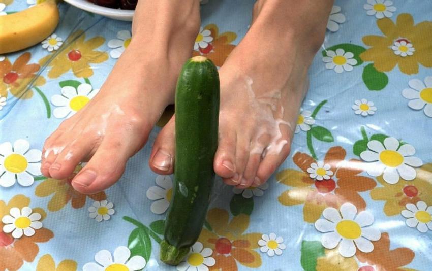 15P Amateur holding cucumber with feet