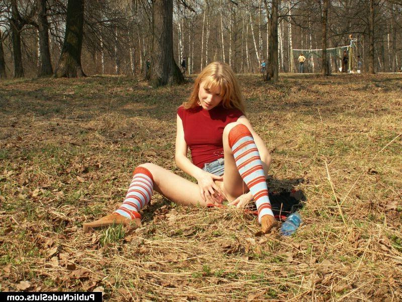 15P Naughty chick regales her tight pussy with a cucumber in public place