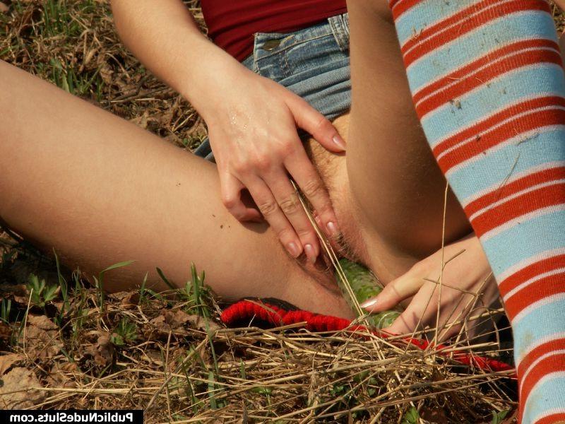 15P Naughty chick regales her tight pussy with a cucumber in public place