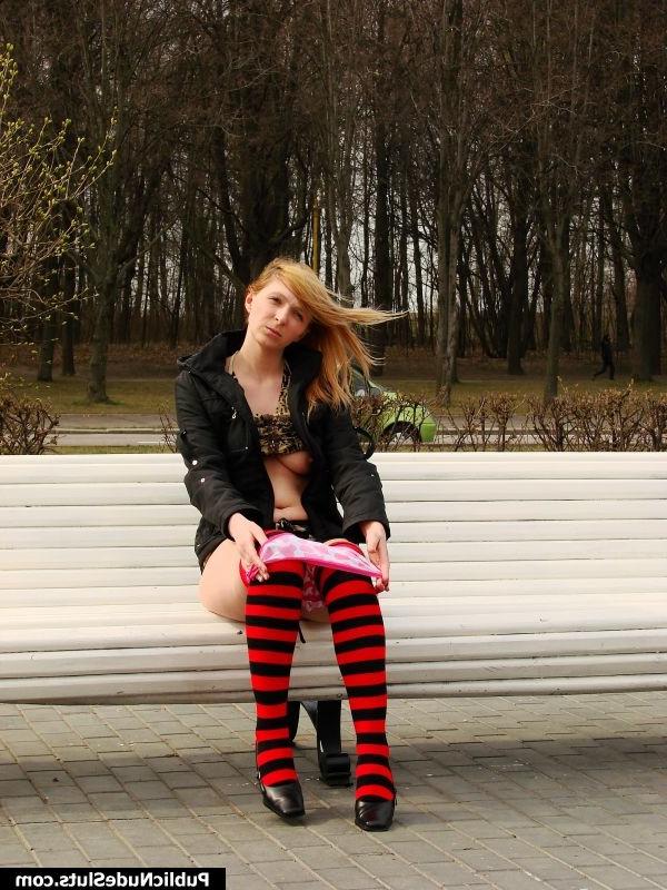 15P Slutty hottie enjoys showing her nude bubbies and pussy on the bench