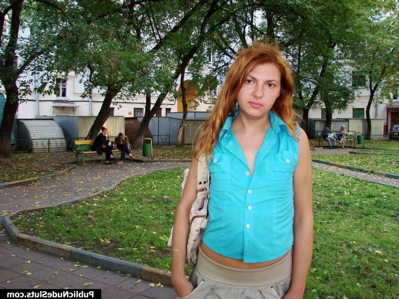 15P Adventurous hotsy has fun showing her titties and pussy in the street