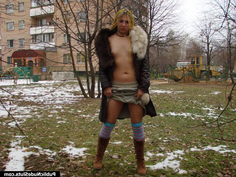 15P Insolent girl dares to show her nude tits and puss in the cold street
