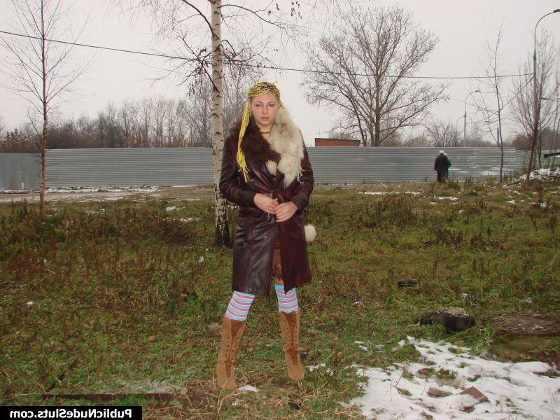 15P Insolent girl dares to show her nude tits and puss in the cold street