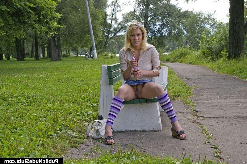 15P Impudent slut rubbing her cunt with vibrator on the bench in the park