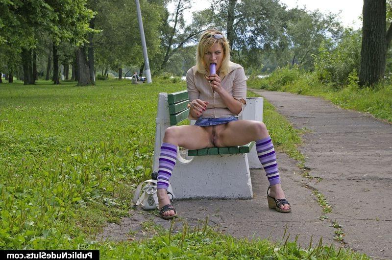 15P Impudent slut rubbing her cunt with vibrator on the bench in the park