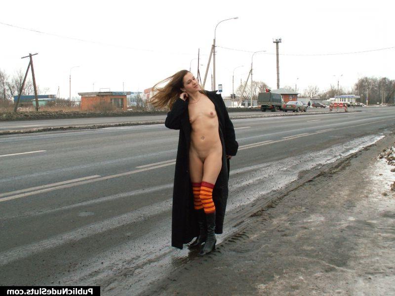 15P Terrific nude promenade of a longhaired hottie along the winter road