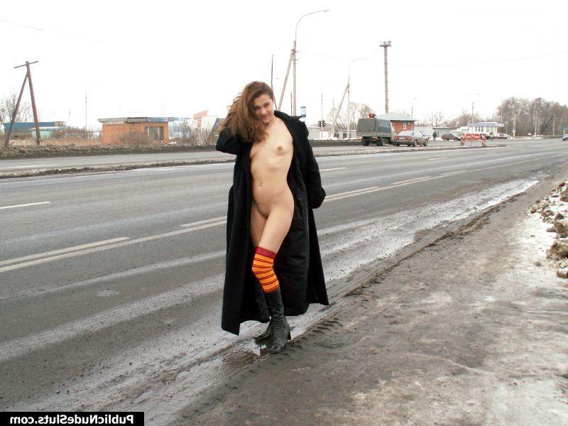 15P Terrific nude promenade of a longhaired hottie along the winter road