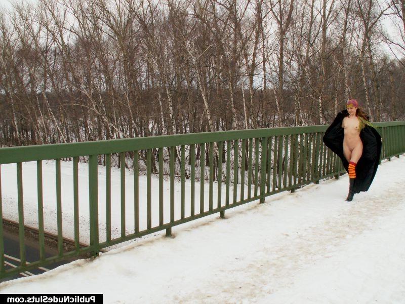 15P Terrific nude promenade of a longhaired hottie along the winter road