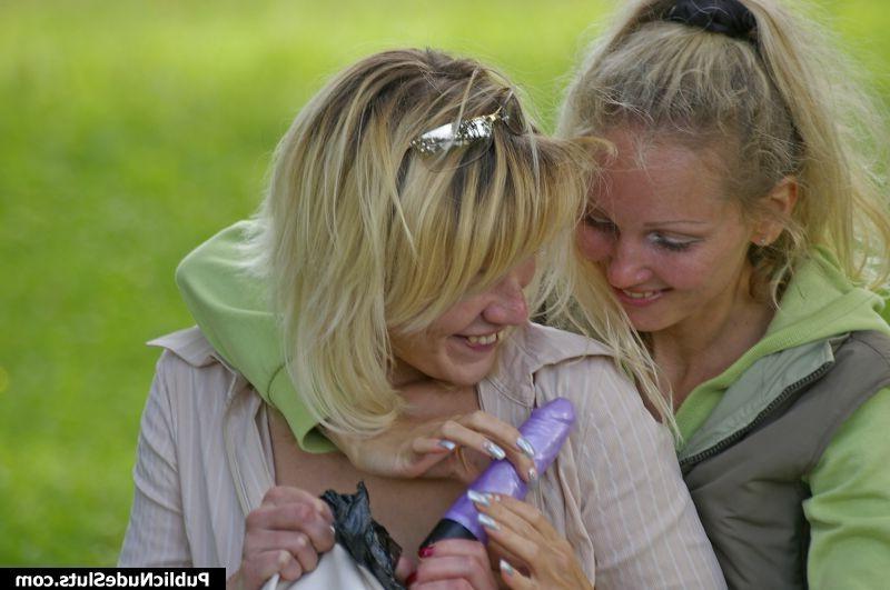 15P Pair of blonde lesbians playing the sizzling vibro games in the park