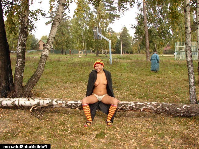 15P Playful hottie gets naughty and reveals her nude spots in the park