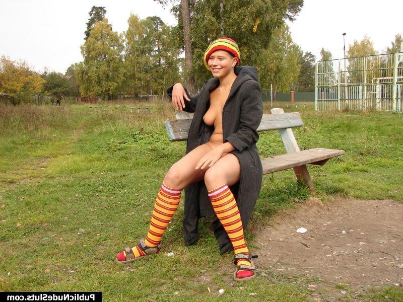 15P Playful hottie gets naughty and reveals her nude spots in the park