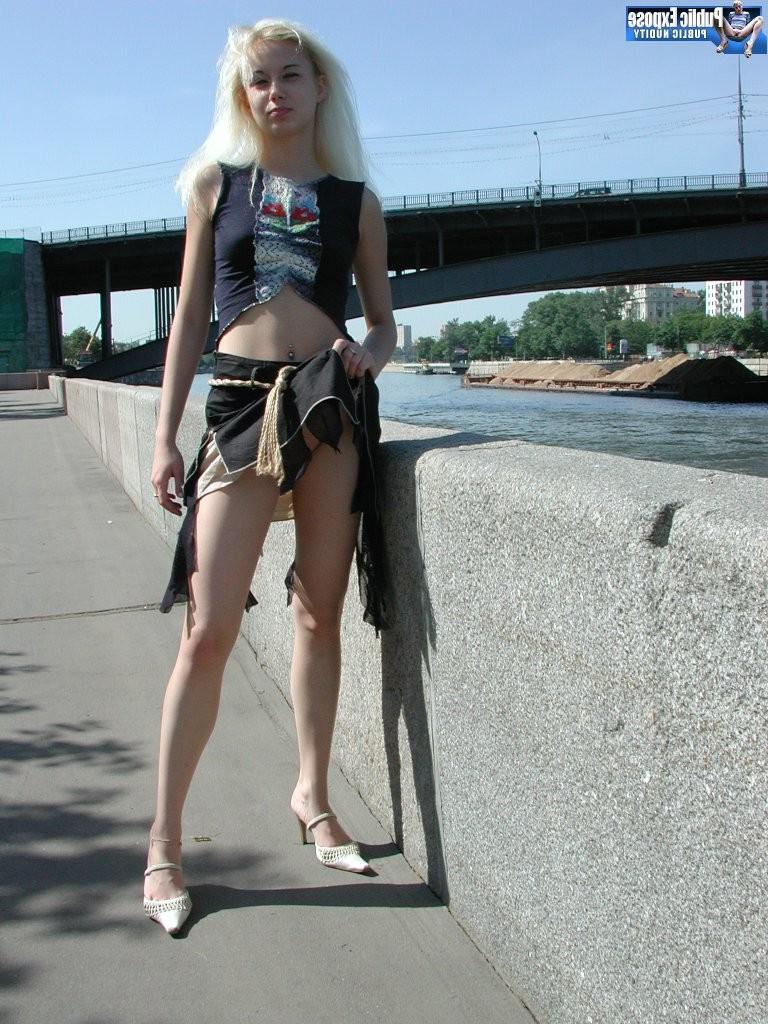 15P Exposed small boobies and honey pot of a blonde street exhibitionist