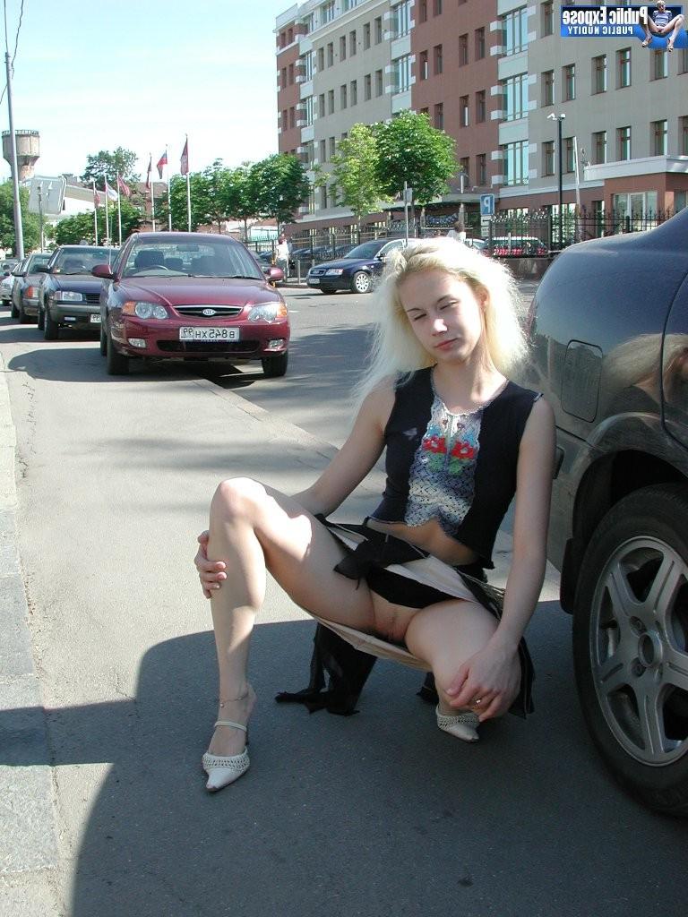 15P Exposed small boobies and honey pot of a blonde street exhibitionist