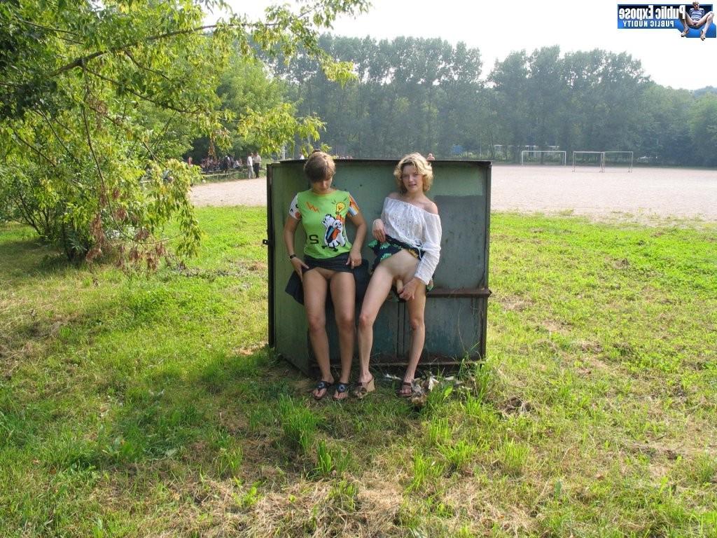 15P Sexy itchy miss flashing and toying her lesbian galfriend behind a bin