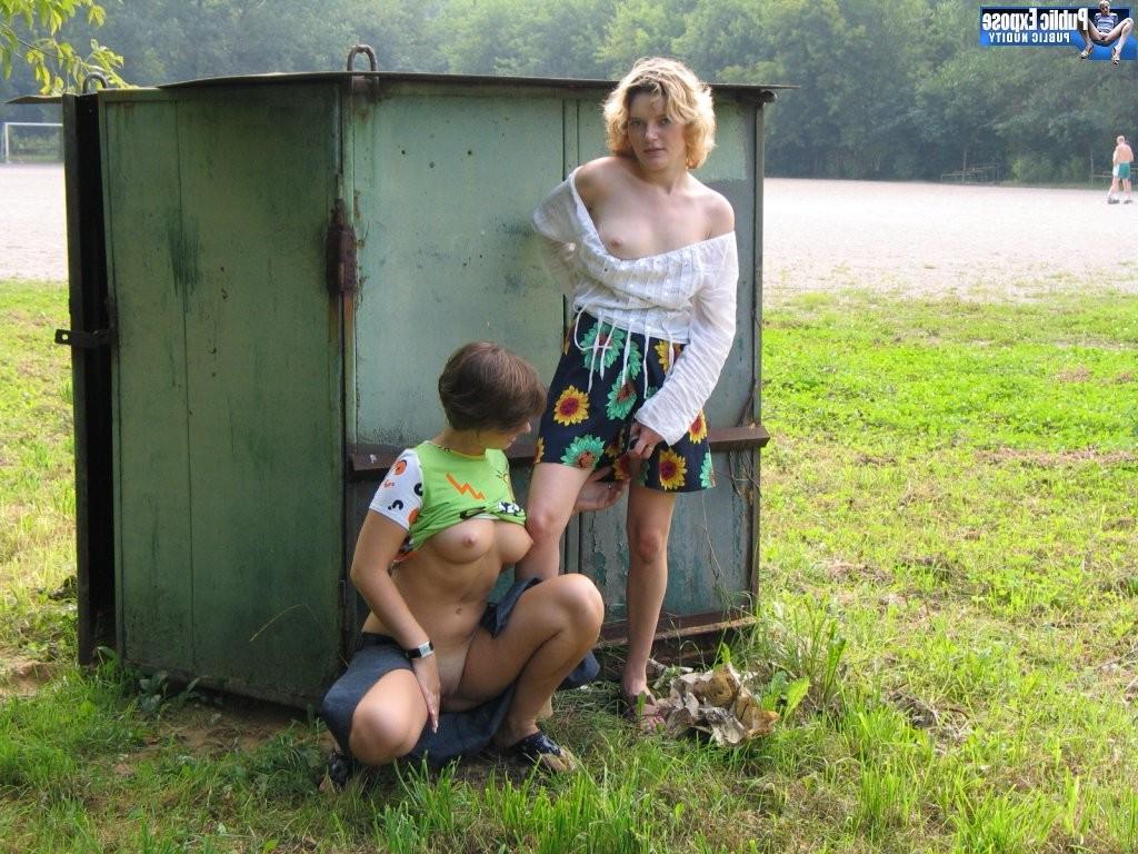 15P Sexy itchy miss flashing and toying her lesbian galfriend behind a bin