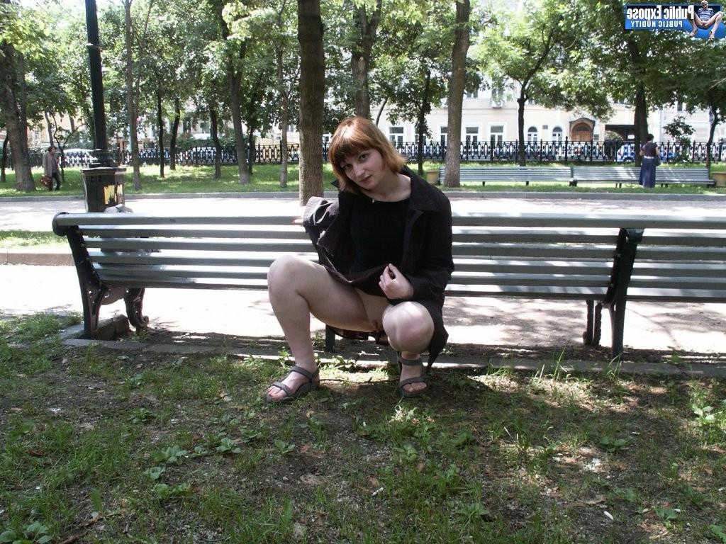 15P Untanned missy demonstrates her titties and shaven pussy in the park