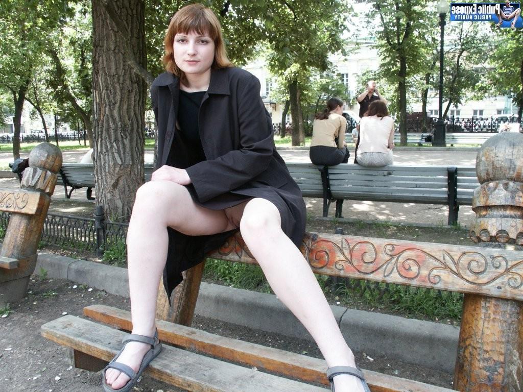15P Untanned missy demonstrates her titties and shaven pussy in the park