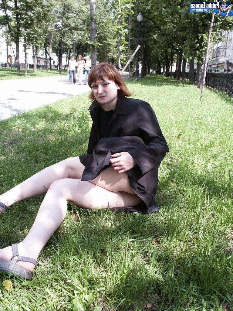 15P Slutty chickie lays bare her boobs and pussy shamelessly on the lawn