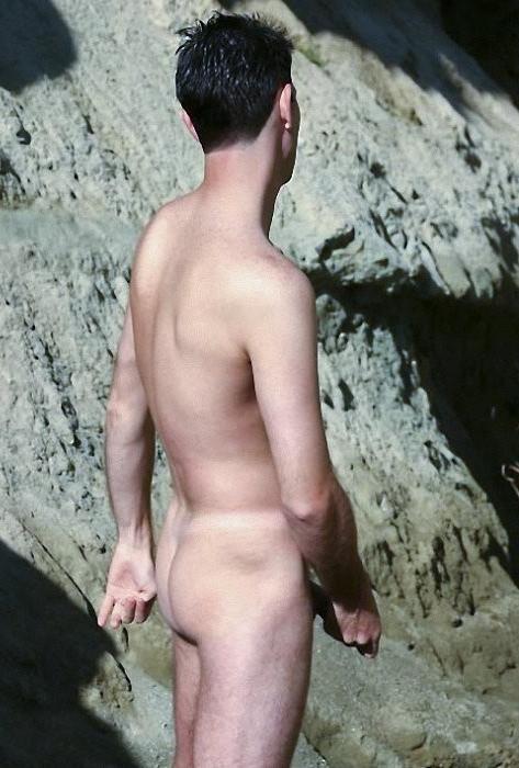 20P A huge cock stud enjoys stripping and showing off in the hills