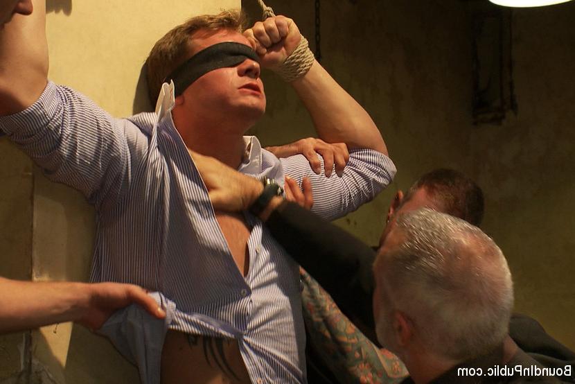 15P A stud endures brutal face and ass fucking by a crowd of strangers while suspen
