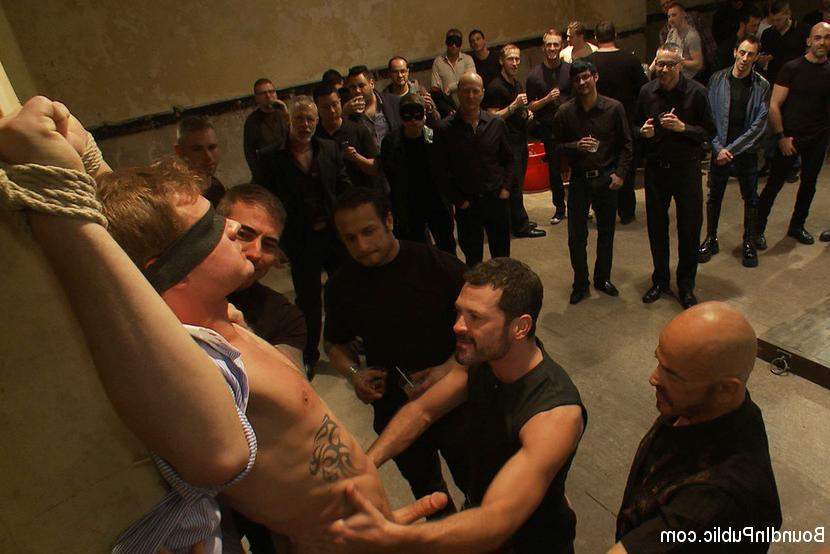 15P A stud endures brutal face and ass fucking by a crowd of strangers while suspen