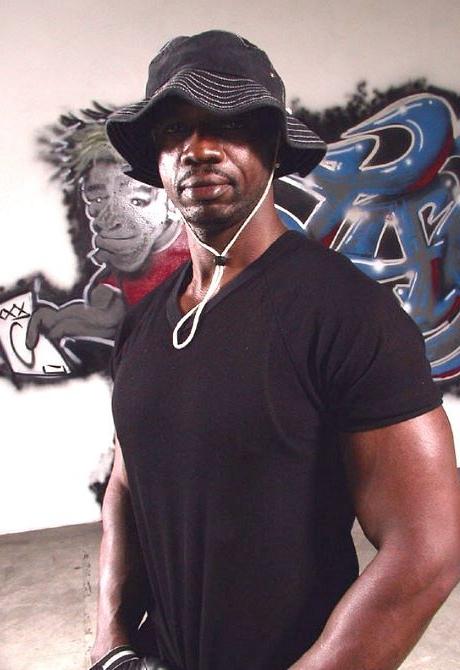 20P Black mature muscle dude stripping and showing off