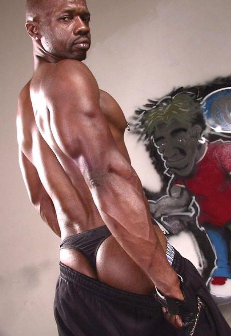 20P Black mature muscle dude stripping and showing off
