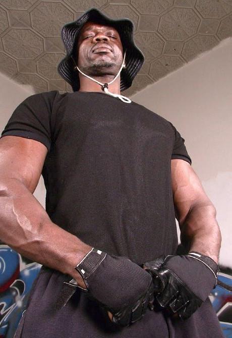 20P Black mature muscle dude stripping and showing off