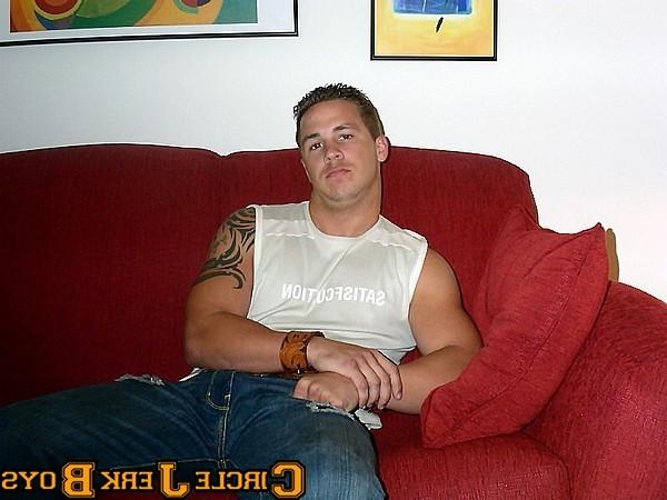 14P Stud with a tattoo taks off his shirt to show his abs off