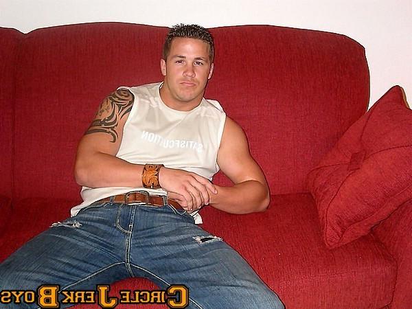 14P Stud with a tattoo taks off his shirt to show his abs off