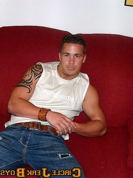 14P Stud with a tattoo taks off his shirt to show his abs off