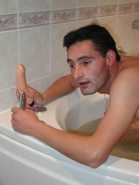 13P Horny stud taking a bath and fucking a toy