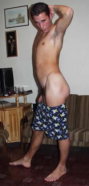13P Hot stud posing in living room