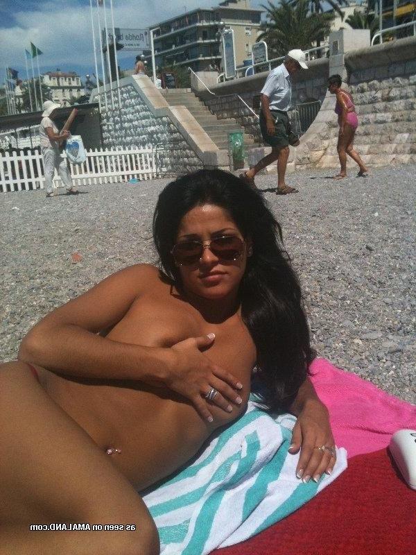 14P Collection of a kinky Latina chick sunbathing topless