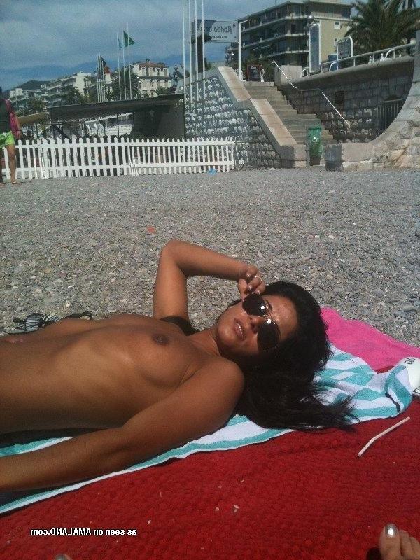 14P Collection of a kinky Latina chick sunbathing topless