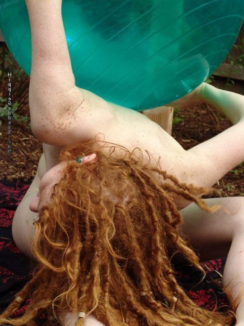 15P Hairy Redhead Hippie Plays Outdoors With Big Aqua Ball