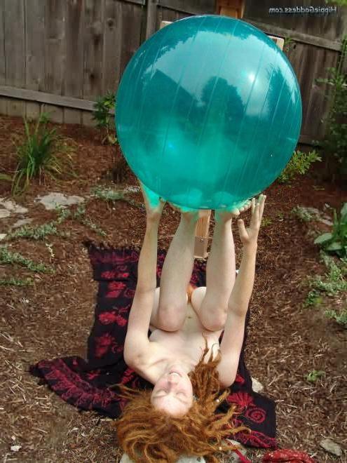 15P Hairy Redhead Hippie Plays Outdoors With Big Aqua Ball