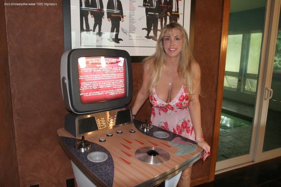 14P Busty blond posing nude on a pool table