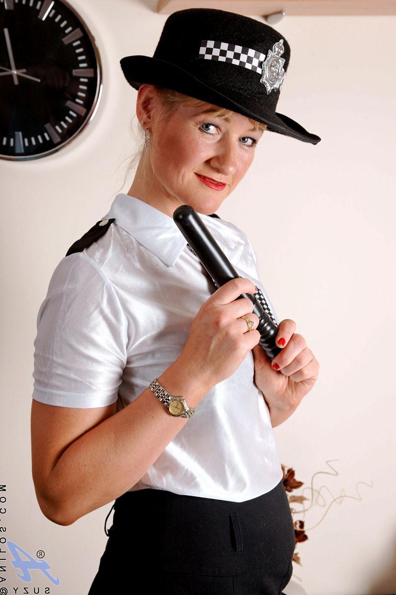 10P Leggy mature police lady fucks her pussy with her night stick