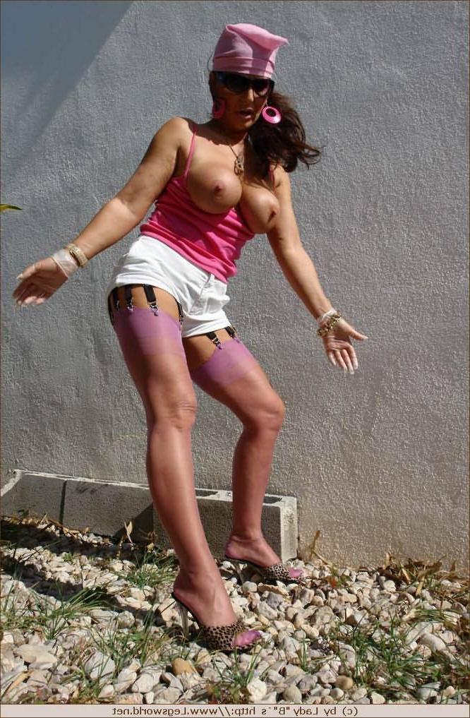 12P Busty mature in pink stockings outdoors