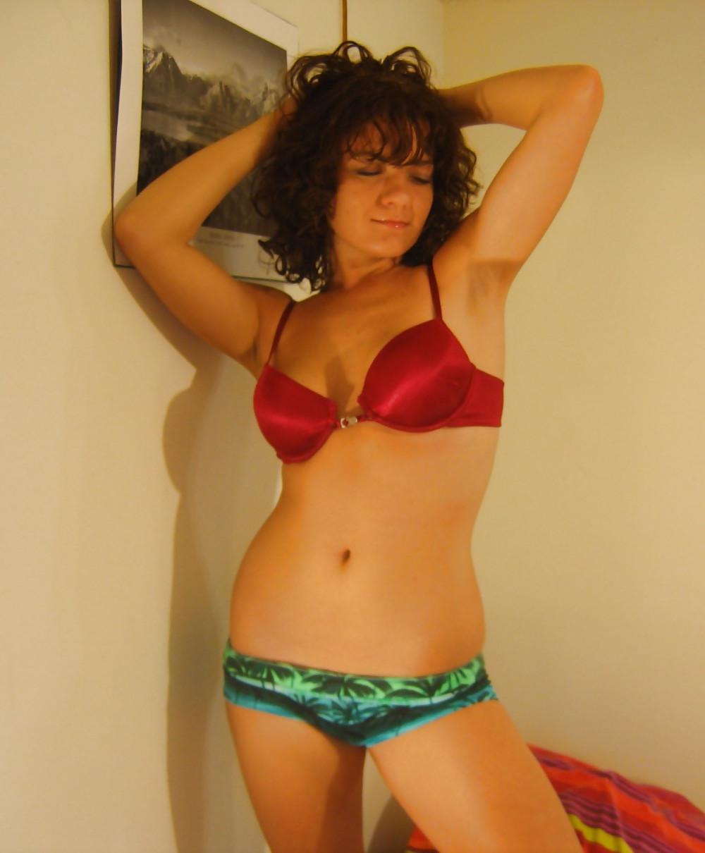 25P BRUNETTE TEEN POSING IN BED